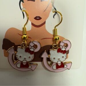 NWT. Hello Kitty in anchor metal dangle earrings